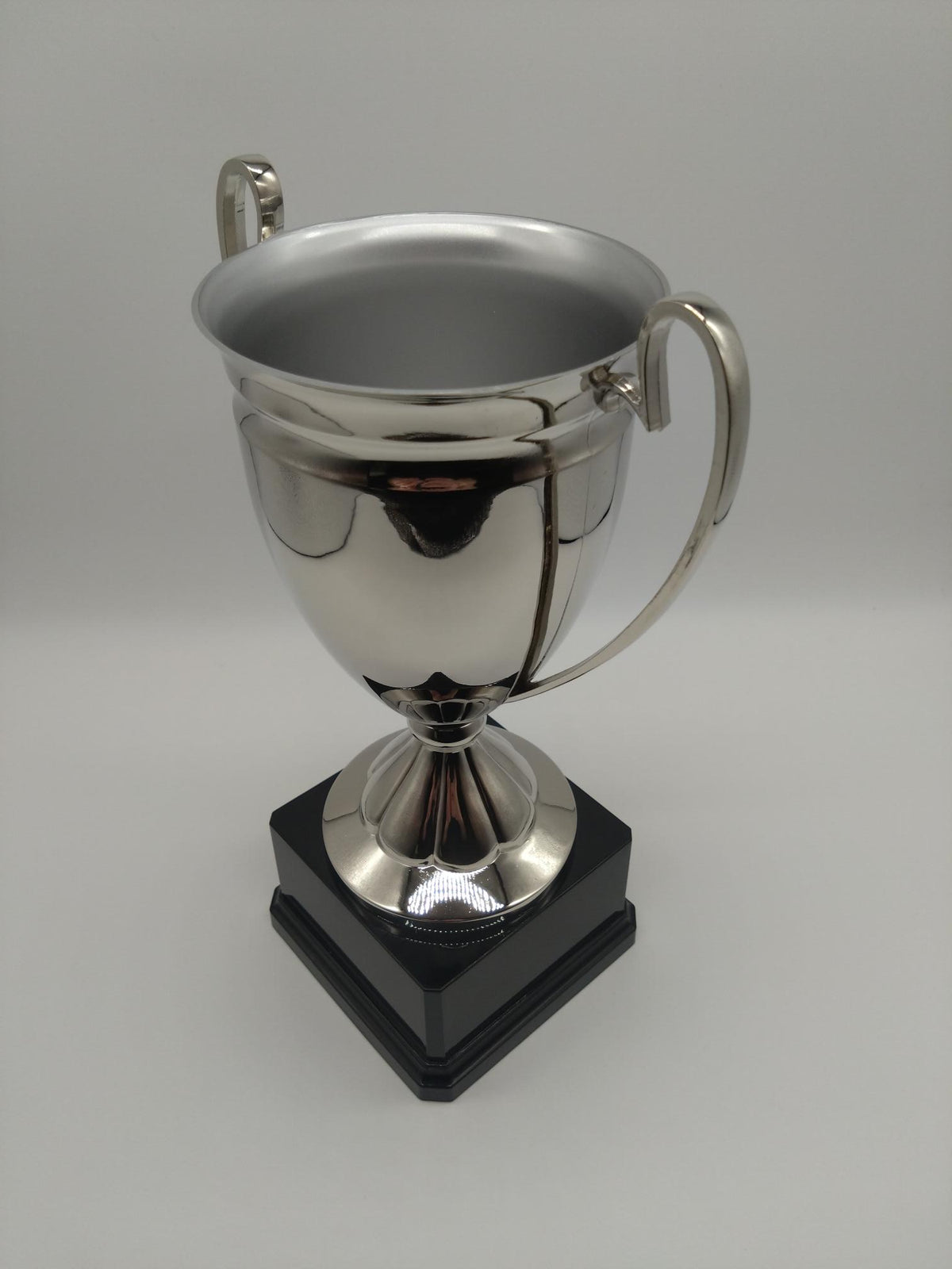 Nickel plated trophy with grey background