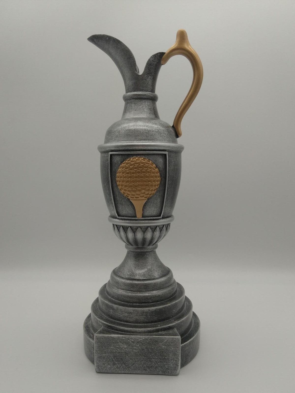 Gray trophy with gold emblem on a white background