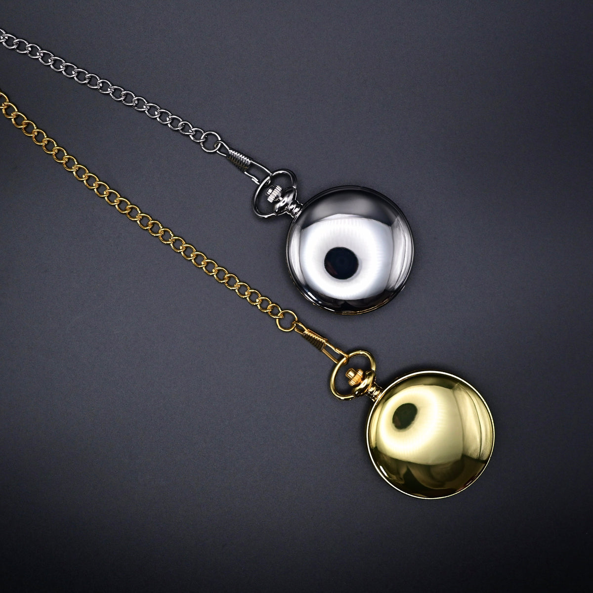 Gold and silver pocket watches with chains