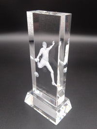 Glass football award view from left front