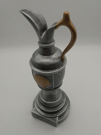 Golf trophy on white background